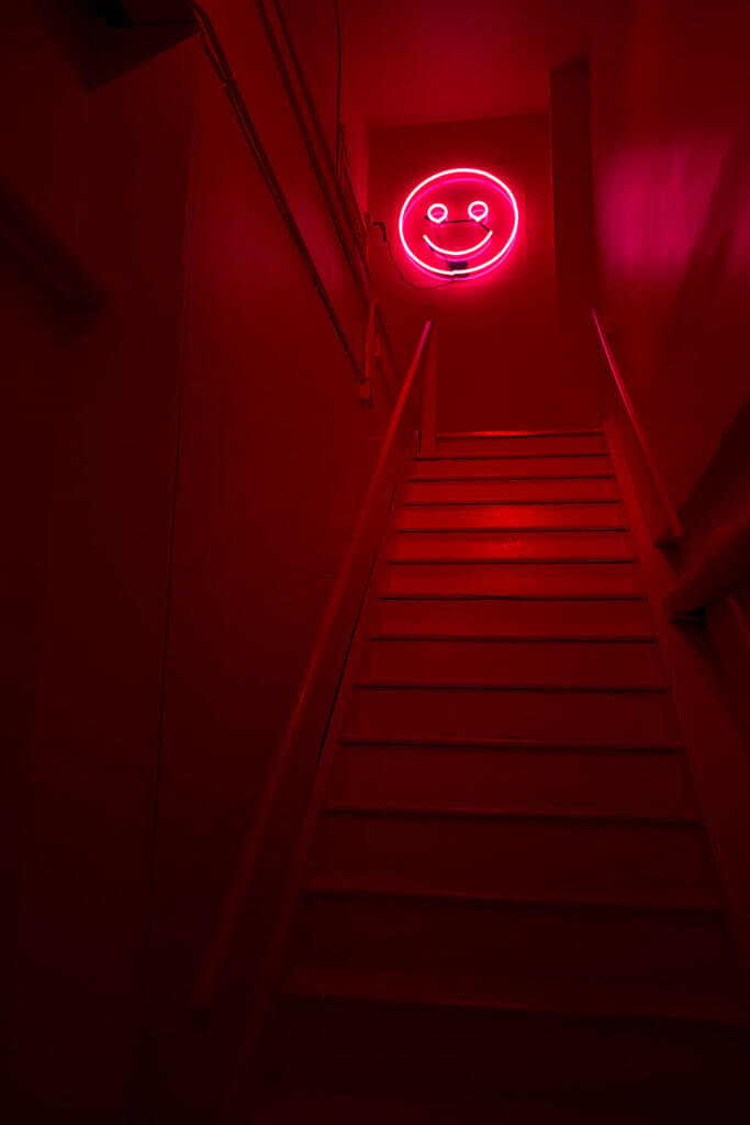 drive-swim-fly-color-factory-san-francisco-union-square-red-room-smiley-face-staircase-stairs