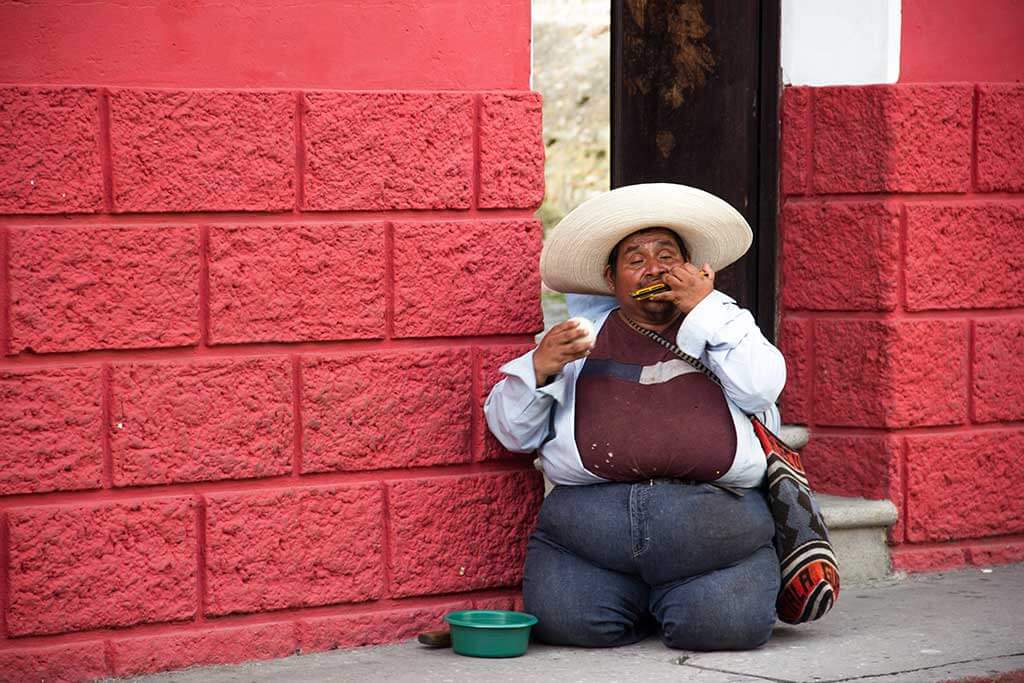 drive-swim-fly-guatemala-central-america-el-faro-antigua-missions-trip-documentary-street-performer