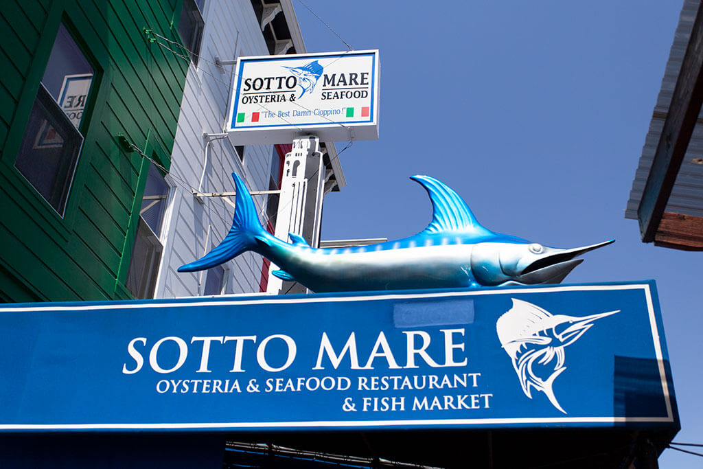 drive-swim-fly-san-francisco-avital-food-tour-north-beach-little-italy-sotto-mare-oysteria-seafood-cioppino-sign
