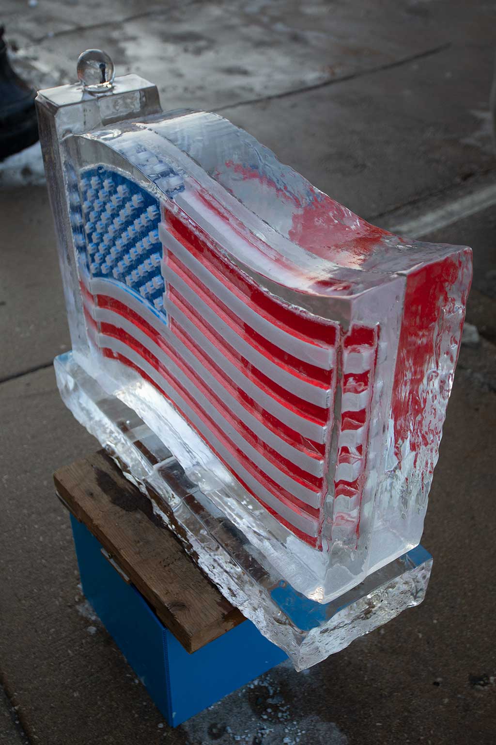 drive-swim-fly-downers-grove-chicago-illinois-ice-sculpture-downtown-businesses-american-flag