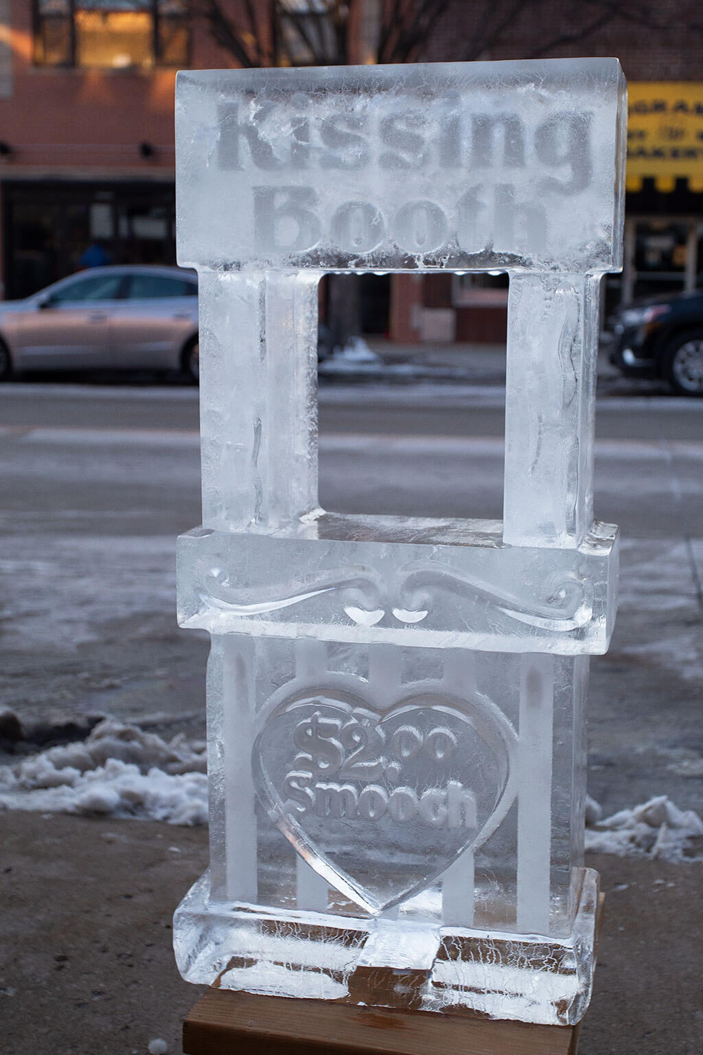 drive-swim-fly-downers-grove-chicago-illinois-ice-sculpture-downtown-businesses-kissing-booth