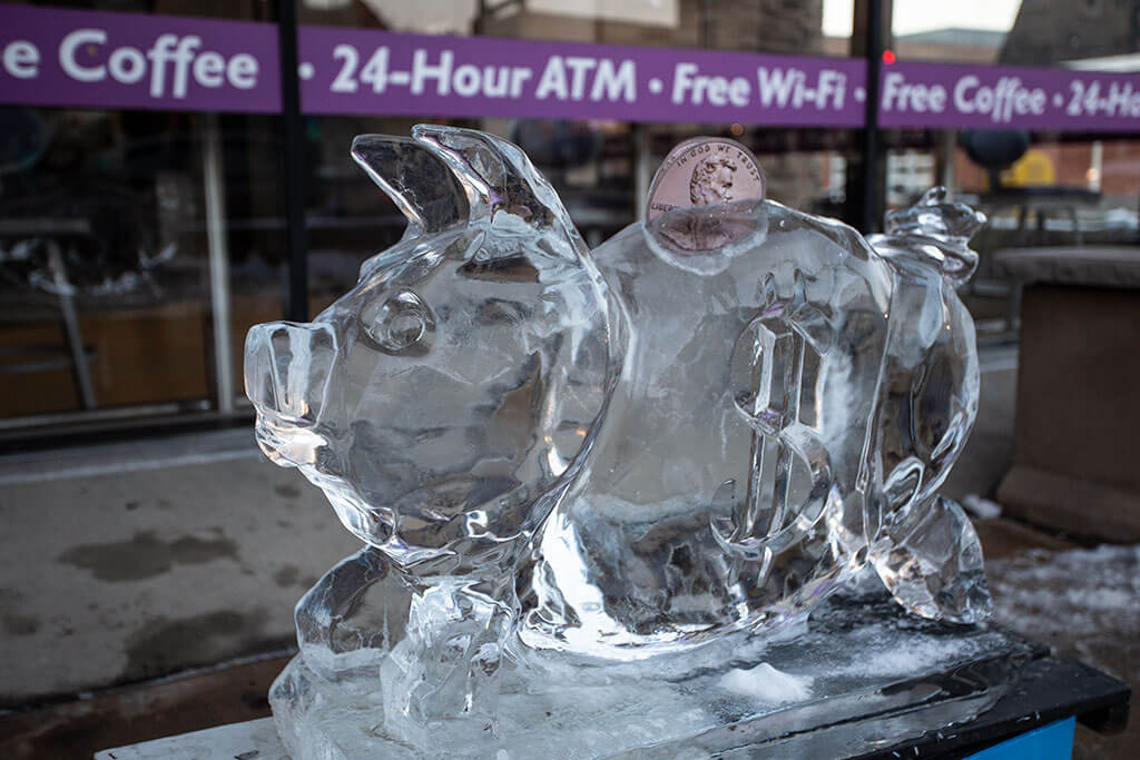 drive-swim-fly-downers-grove-chicago-illinois-ice-sculpture-downtown-businesses-piggy-bank-pig