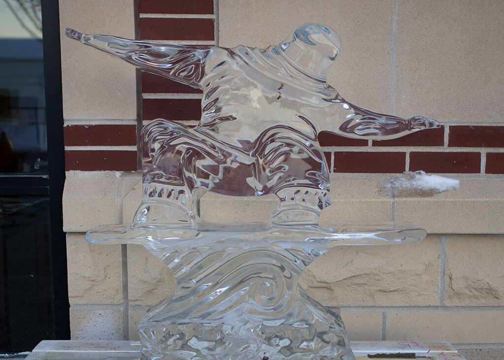 drive-swim-fly-downers-grove-chicago-illinois-ice-sculpture-downtown-businesses-surfer