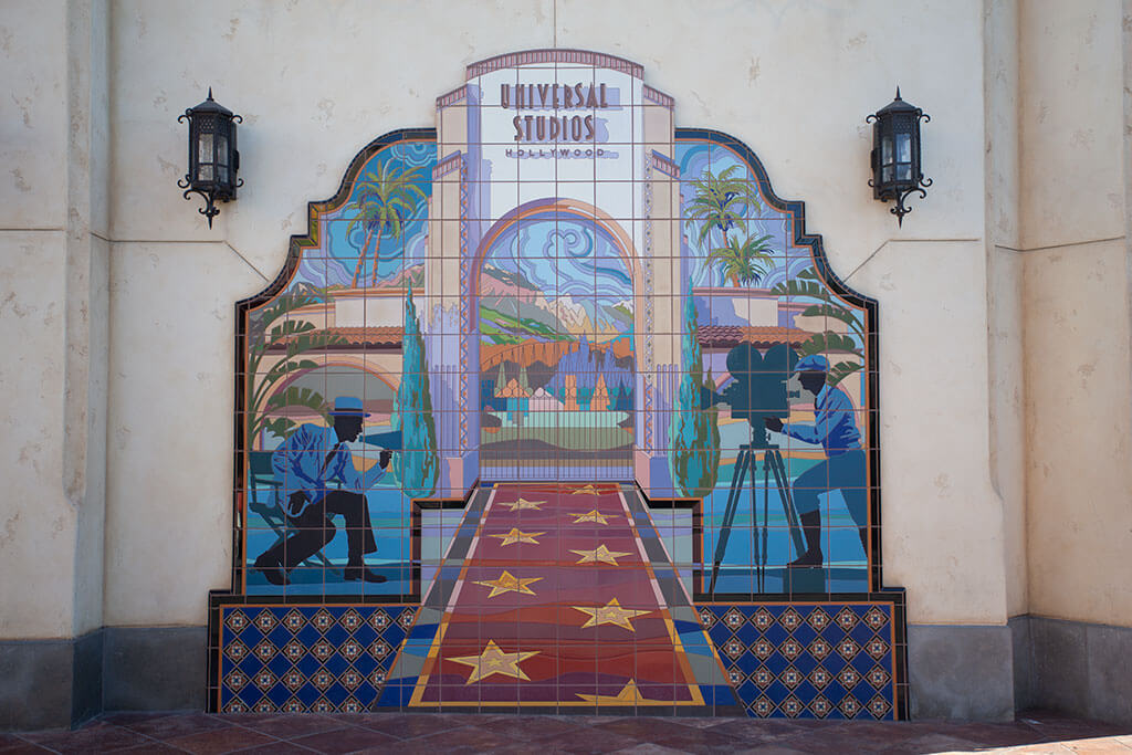 drive-swim-fly-universal-studios-hollywood-california-theme-park-mural-movie-history-lore-vintage