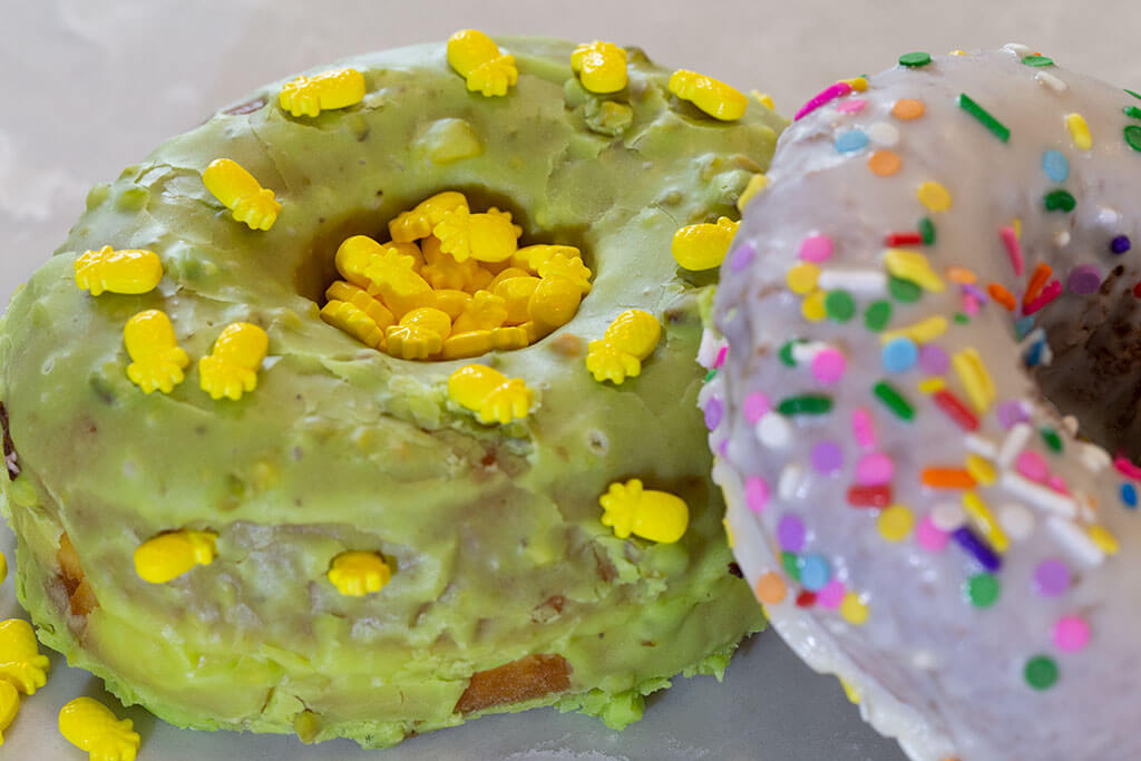 drive-swim-fly-pineapple-collection-stans-donuts-chicagoland-pistachio-donut-pineapple-sugar-sprinkles-icing-header