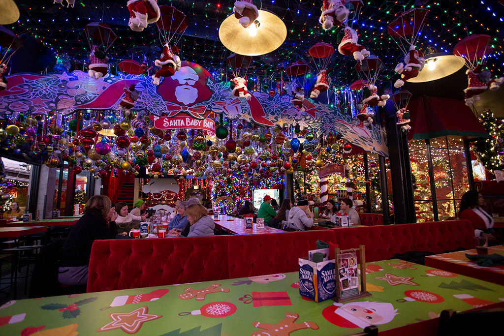 drive-swim-fly-christmas-santa-baby-bar-wrigleyville-chicago-illinois-santas-ornaments-on-ceiling