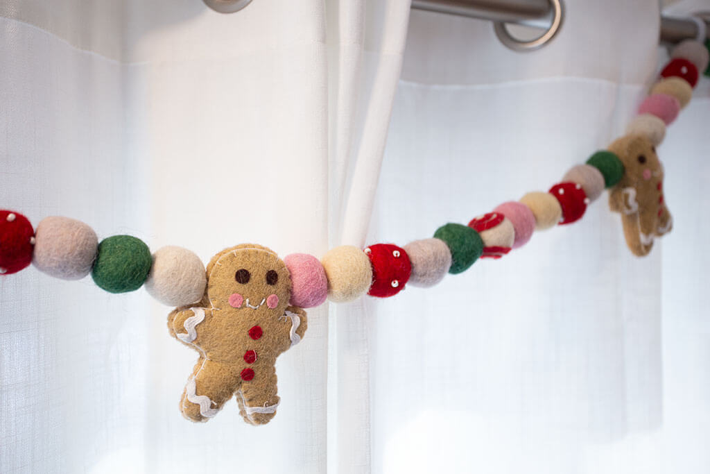 drive-swim-fly-pink-christmas-decor-holiday-gingerbread-man-garland