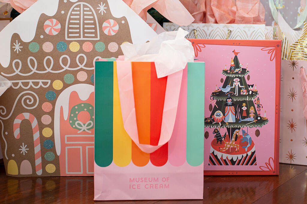 drive-swim-fly-pink-christmas-decor-holiday-museum-of-ice-cream-gift-bags