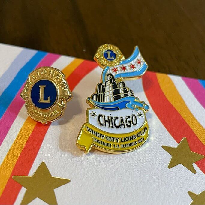 drive-swim-fly-lions-club-chicagoland-chicago-windy-city-lions-enamel-pins