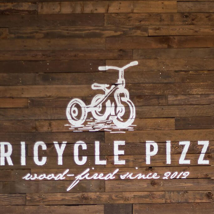 drive-swim-fly-tricycle-pizza-monterey-california-food-truck-sign-header